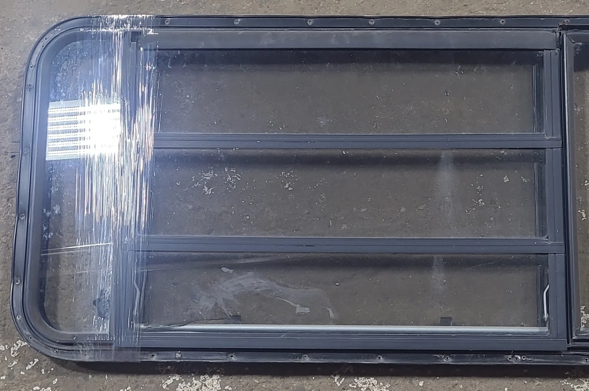 Used Black Radius Emergency Opening Window : 21 3/4" W x 59 3/4" H x 1 1/4" D - Image 2