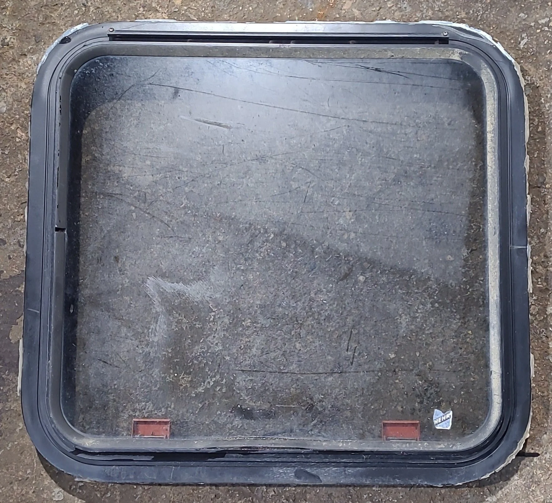 Used Black Radius Emergency Opening Window : 23 1/2" W x 21 3/4" H x 1 3/4" D