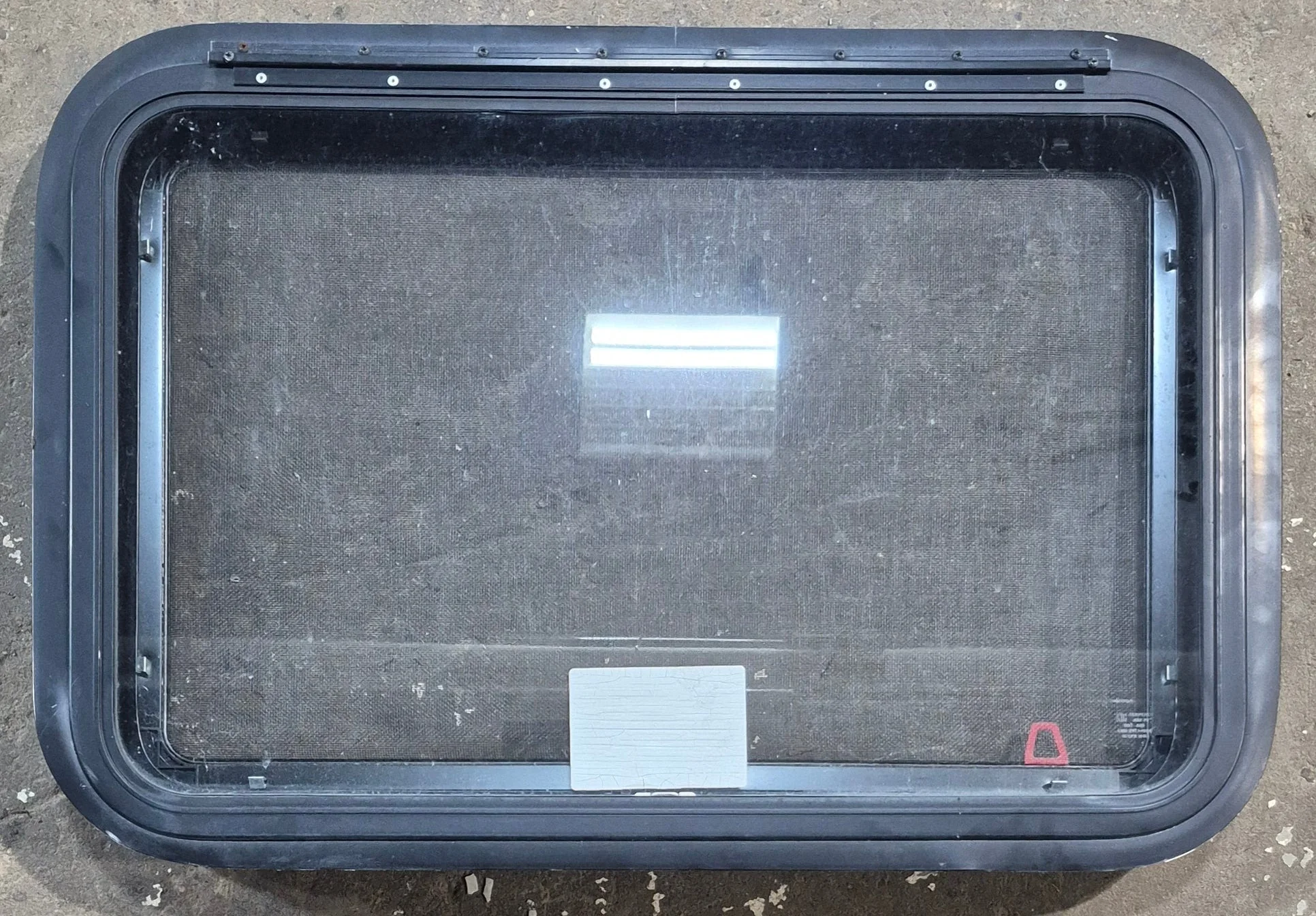 Used Black Radius Emergency Opening Window : 29 1/4" W x 19 1/4" H x 1 3/8" D