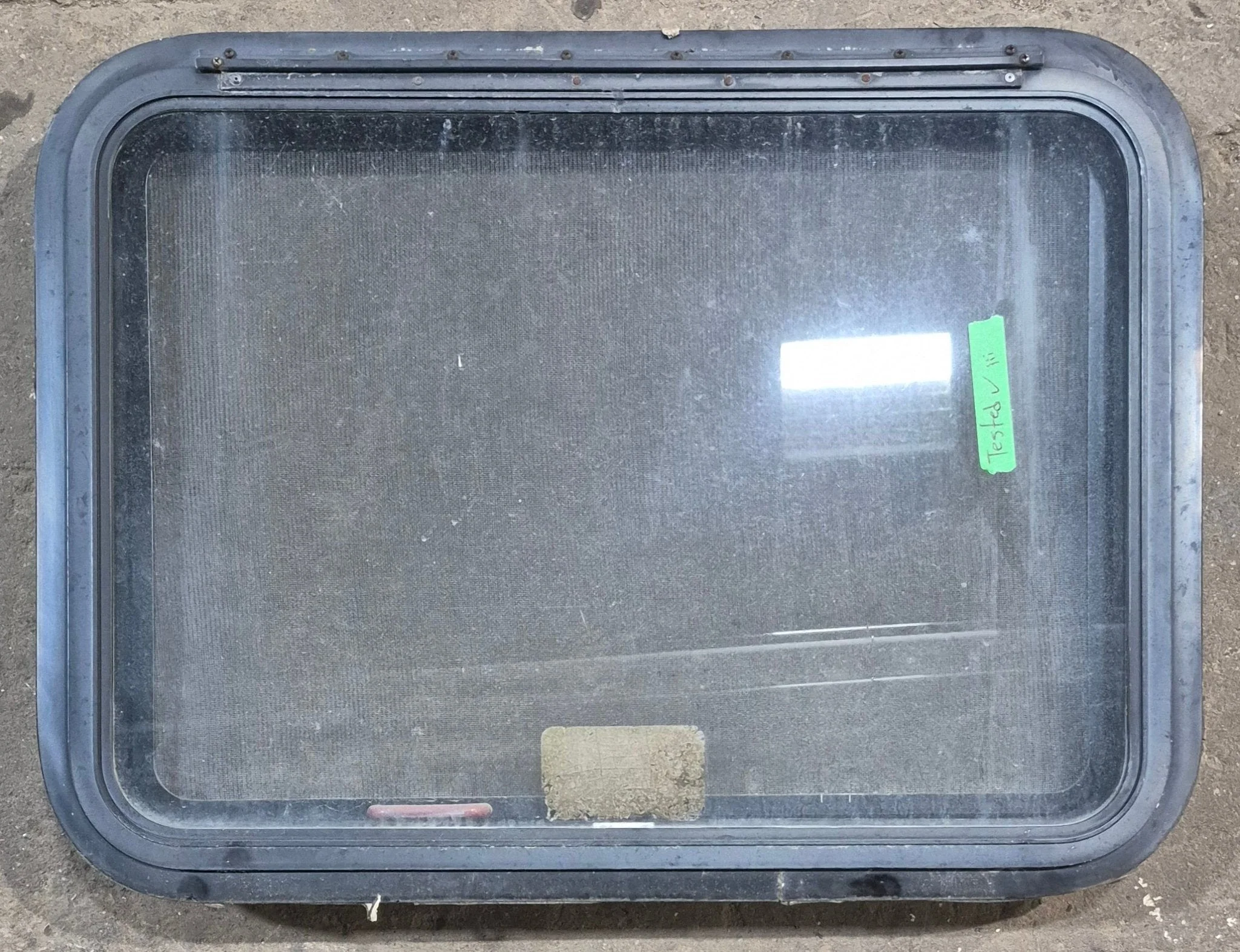 Used Black Radius Emergency Opening Window : 29 1/4" W x 21 1/4" H x 1 7/8" D