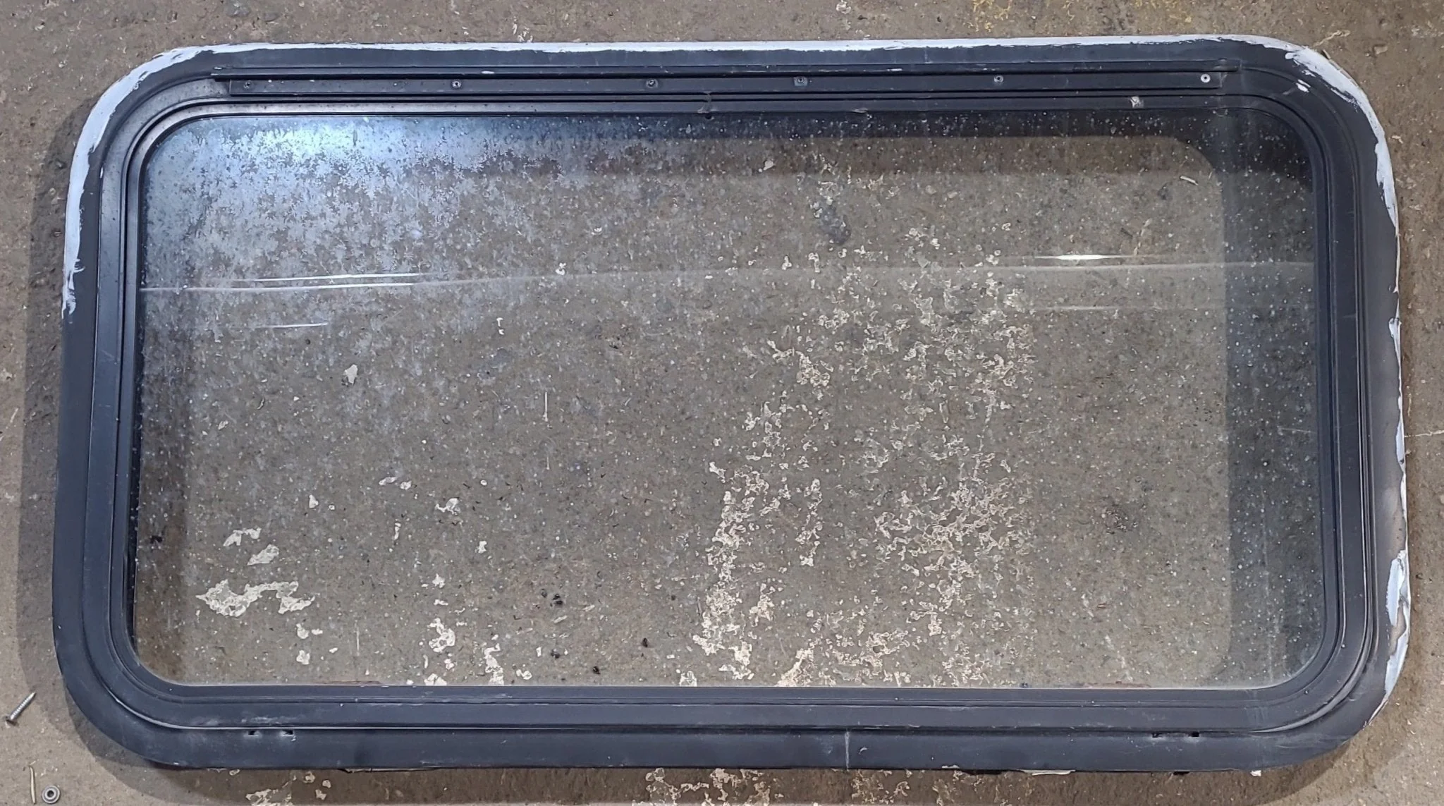 Used Black Radius Emergency Opening Window : 35 1/2" W x 181/2" H x 1 7/8" D