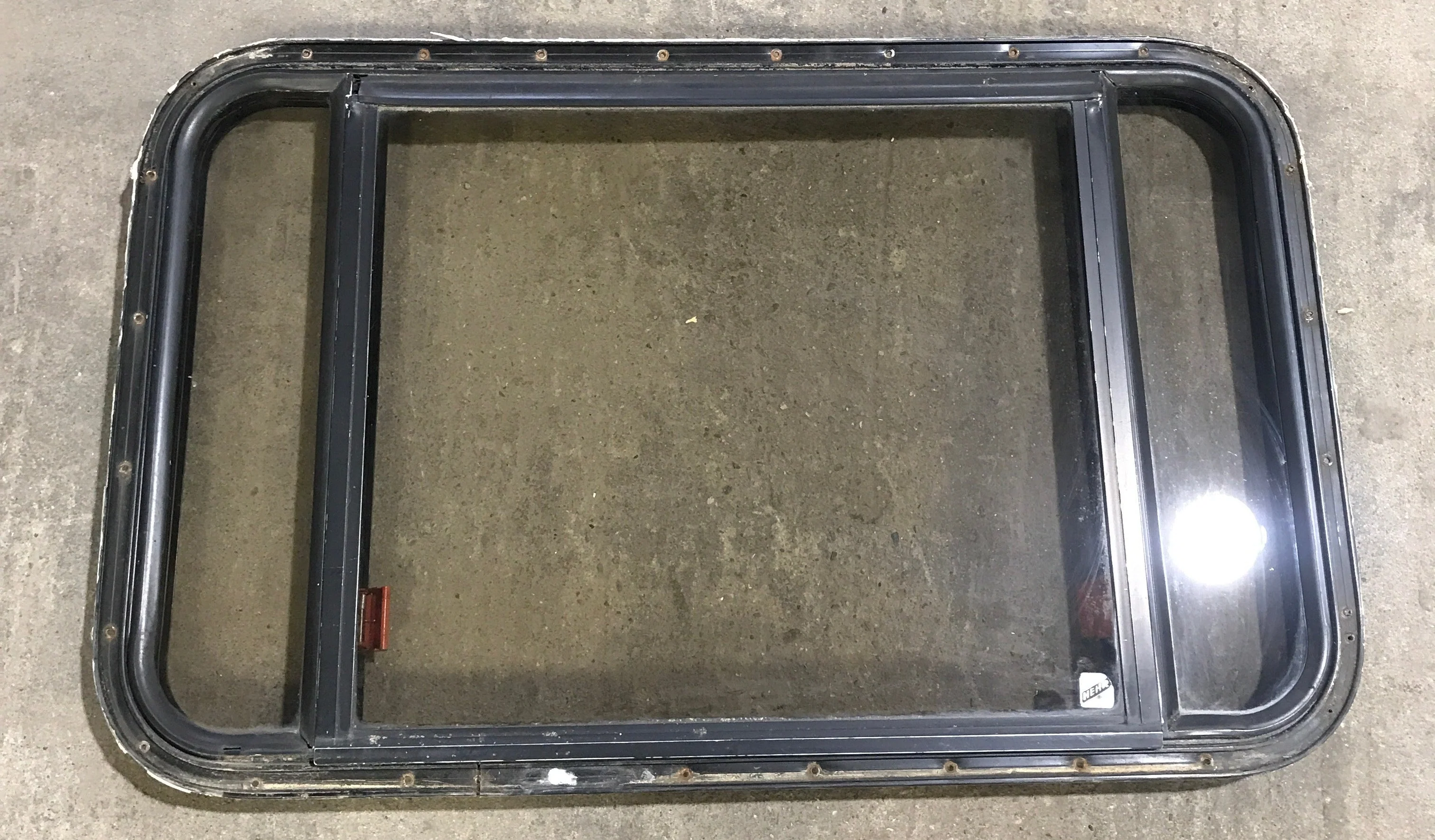 Used Black Radius Emergency Opening Window : 36 3/4" W x 23" H x 1 1/2"