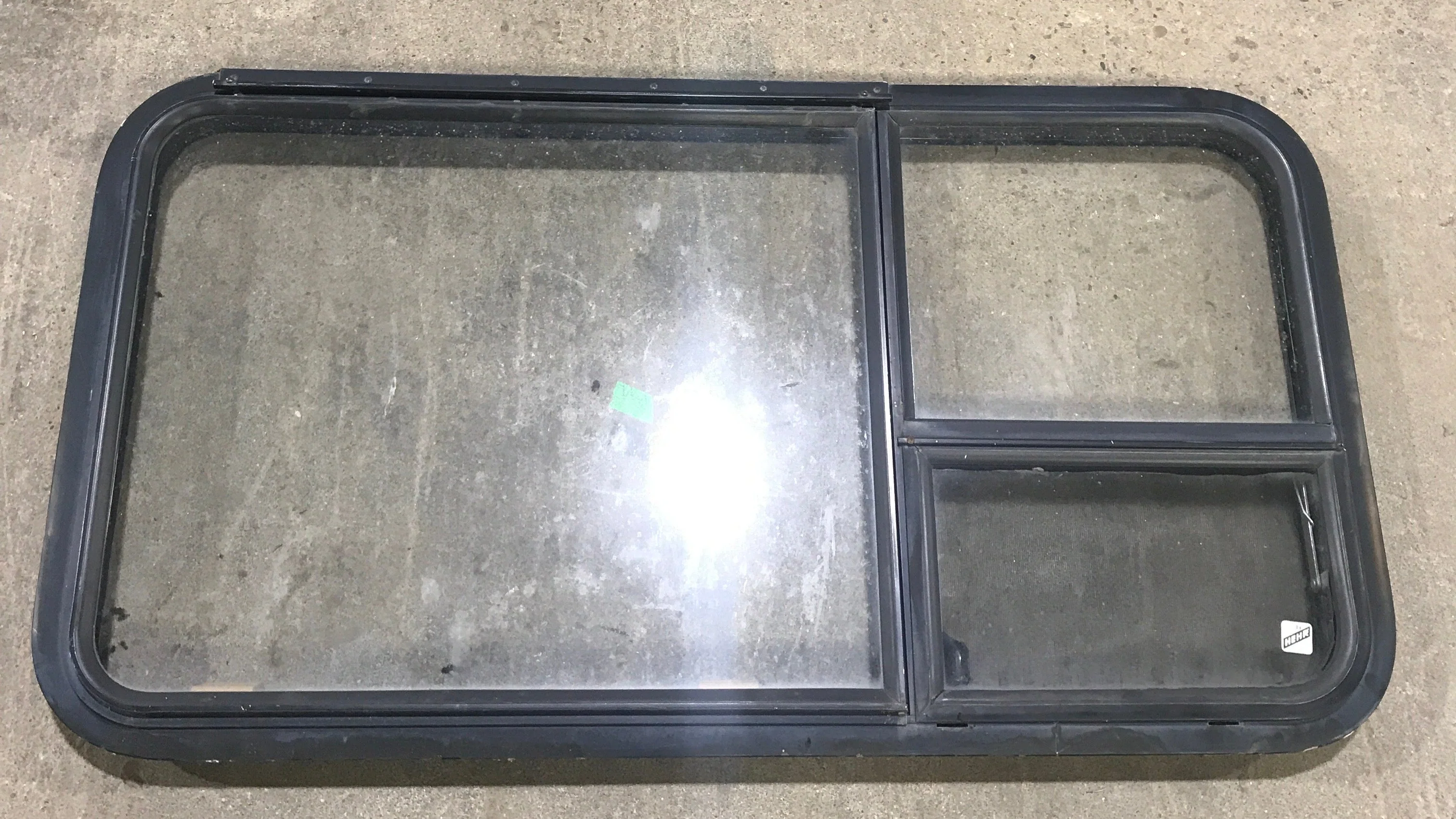 Used Black Radius Emergency Opening Window : 41 1/2" W X 21 1/2" H X 2" D