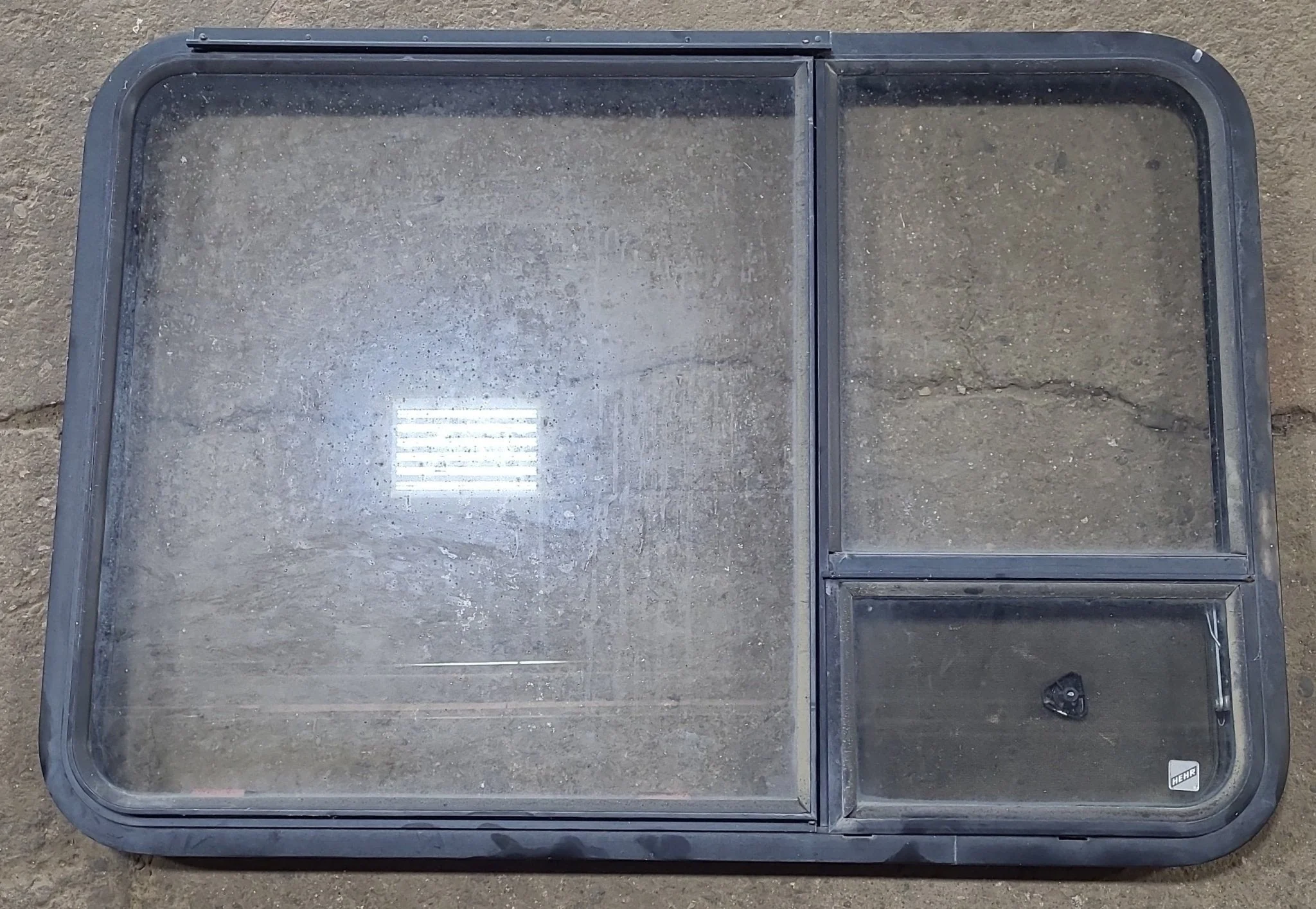 Used Black Radius Emergency Opening Window : 41 3/8" W x 28 5/8" H x 1 7/8" D