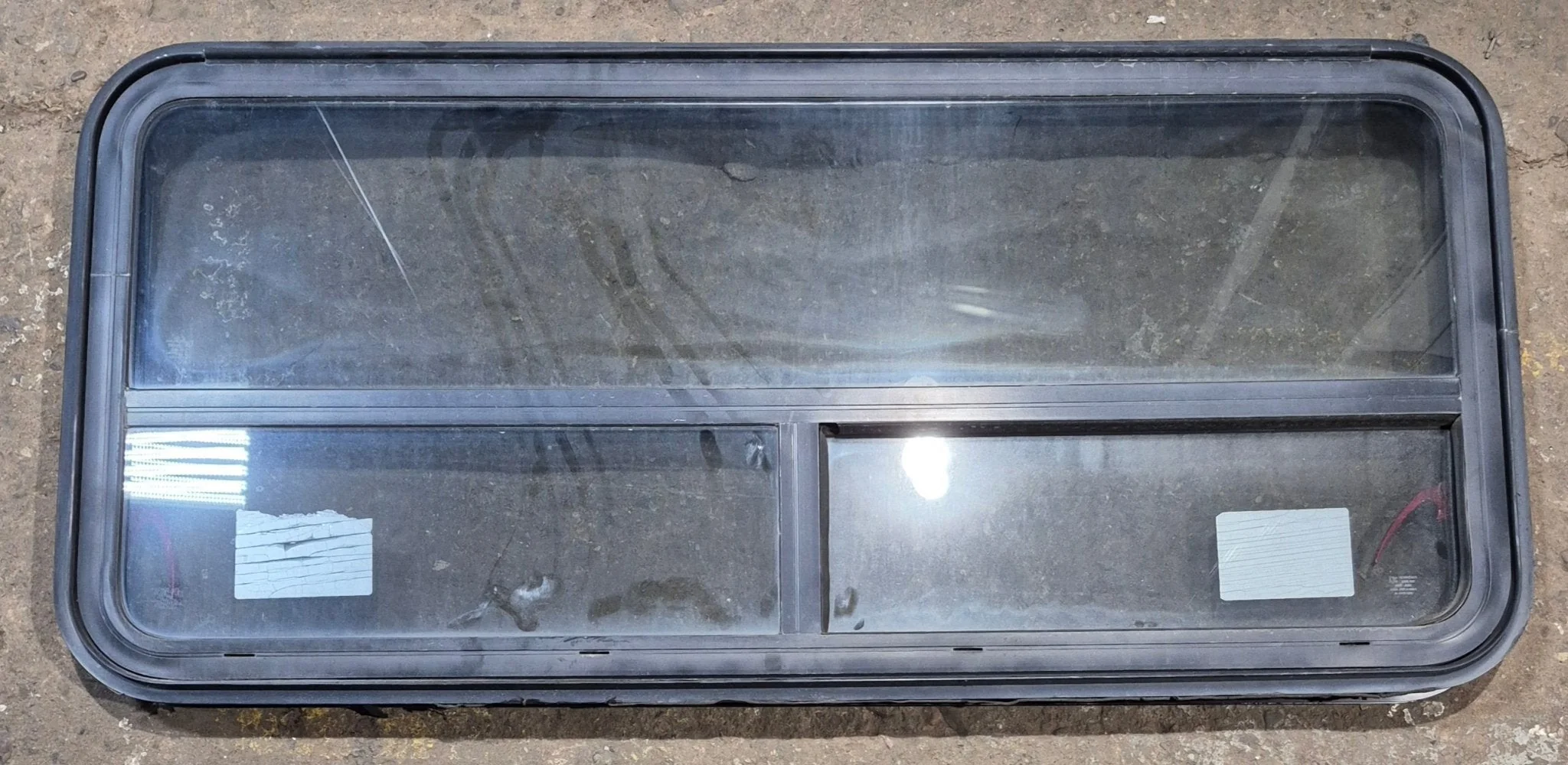 Used Black Radius Emergency Opening Window : 47 1/4" W x 21 1/4" H x 1 3/4" D