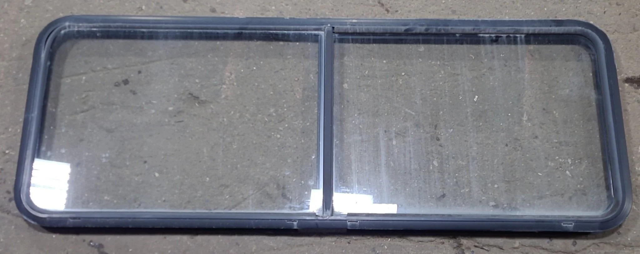 Used Black Radius Emergency Opening Window : 60 1/4" W x 21 3/4" H x 1 7/8" D