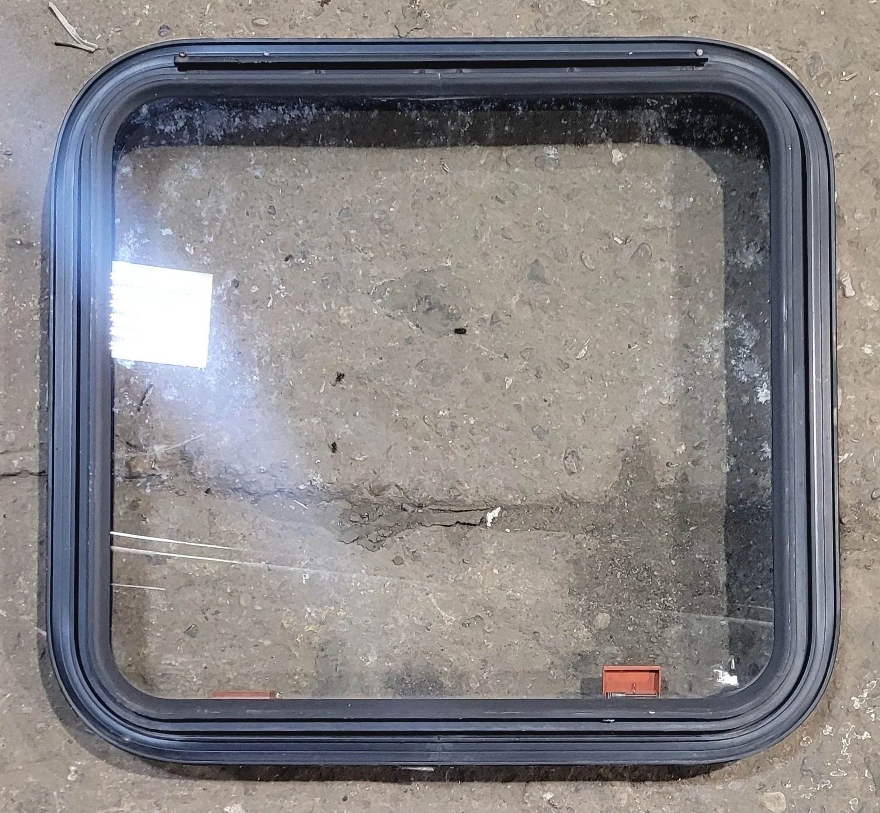 Used Black Radius Emergency Opening Window : 23 1/4" W x 21 1/2" H x 1 7/8"