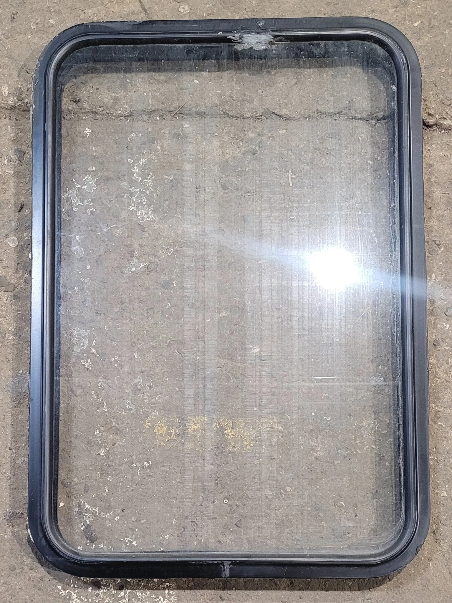 Used Black Radius Non Opening Window : 23 1/4" W x 34 3/4" H x 1 7/8"