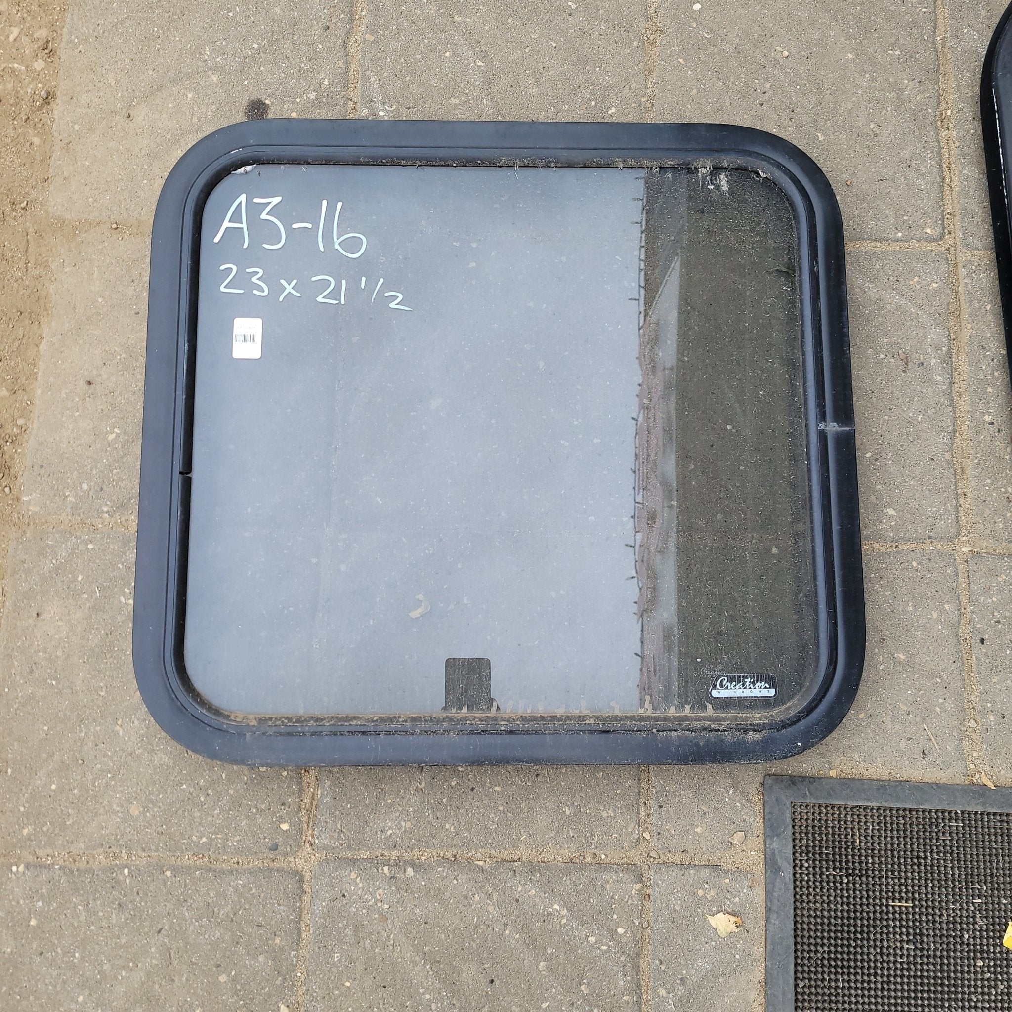 Used Black Radius Non-Opening Window : 23 X 21 1/2 X 2" D