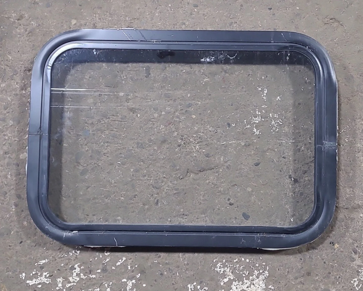 Used Black Radius Non Opening Window : 24 1/4" W x 16 3/4" H x 1 7/8" D