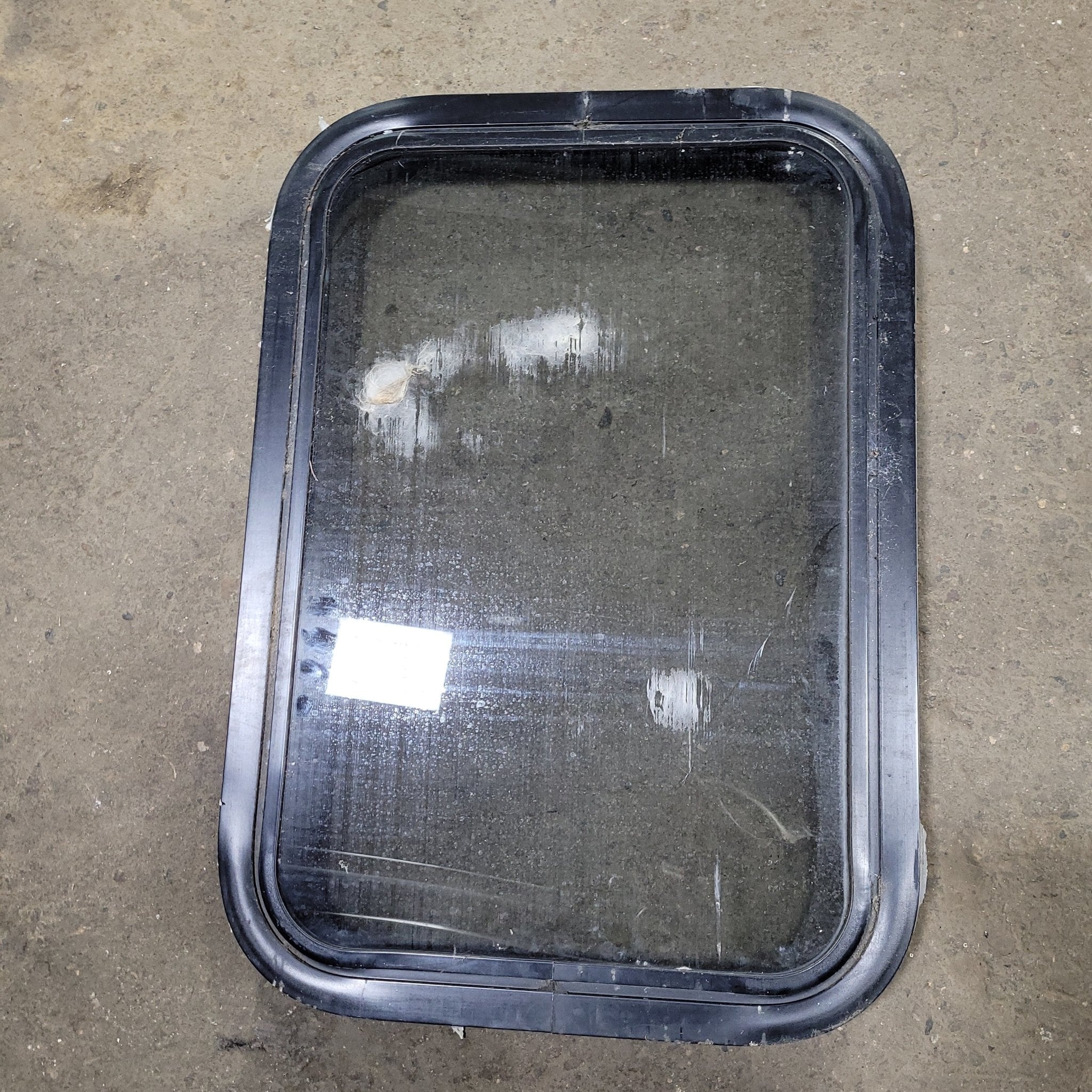 Used Black Radius Non-Opening Window : 24 1/4" X 16 3/4" X 2" D