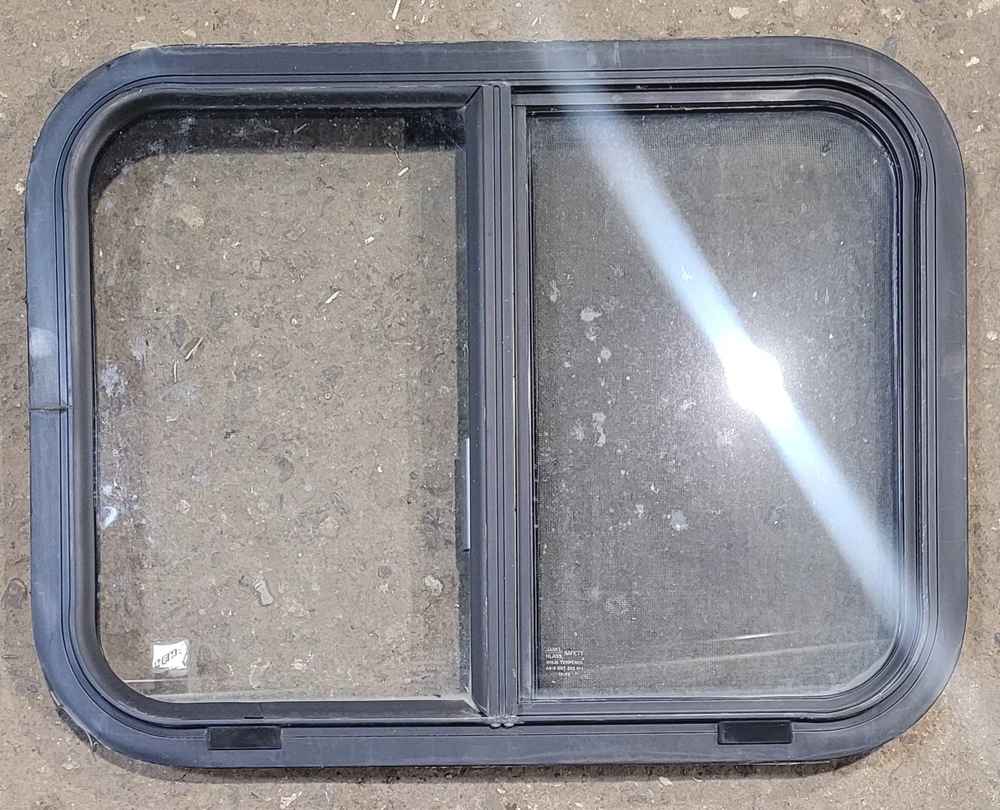 Used Black Radius Opening Window : 23 1/4" W x 17 3/4" H x 1 3/4"