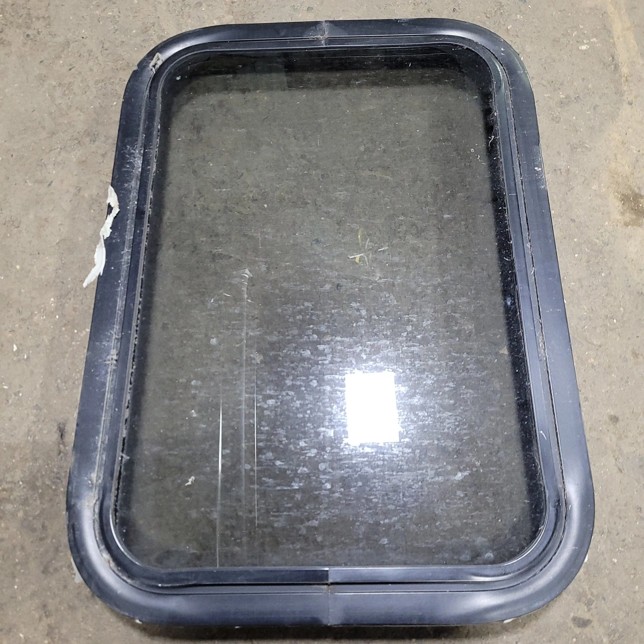 Used Black Radius Non-Opening Window : 24 1/4" X 16 3/4" X 2" D