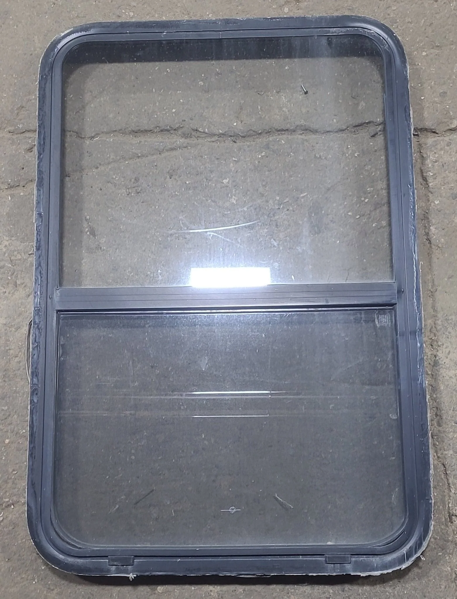 Used Black Radius Opening Window : 26 1/2" W x 39 3/4" H x 1 7/8" D