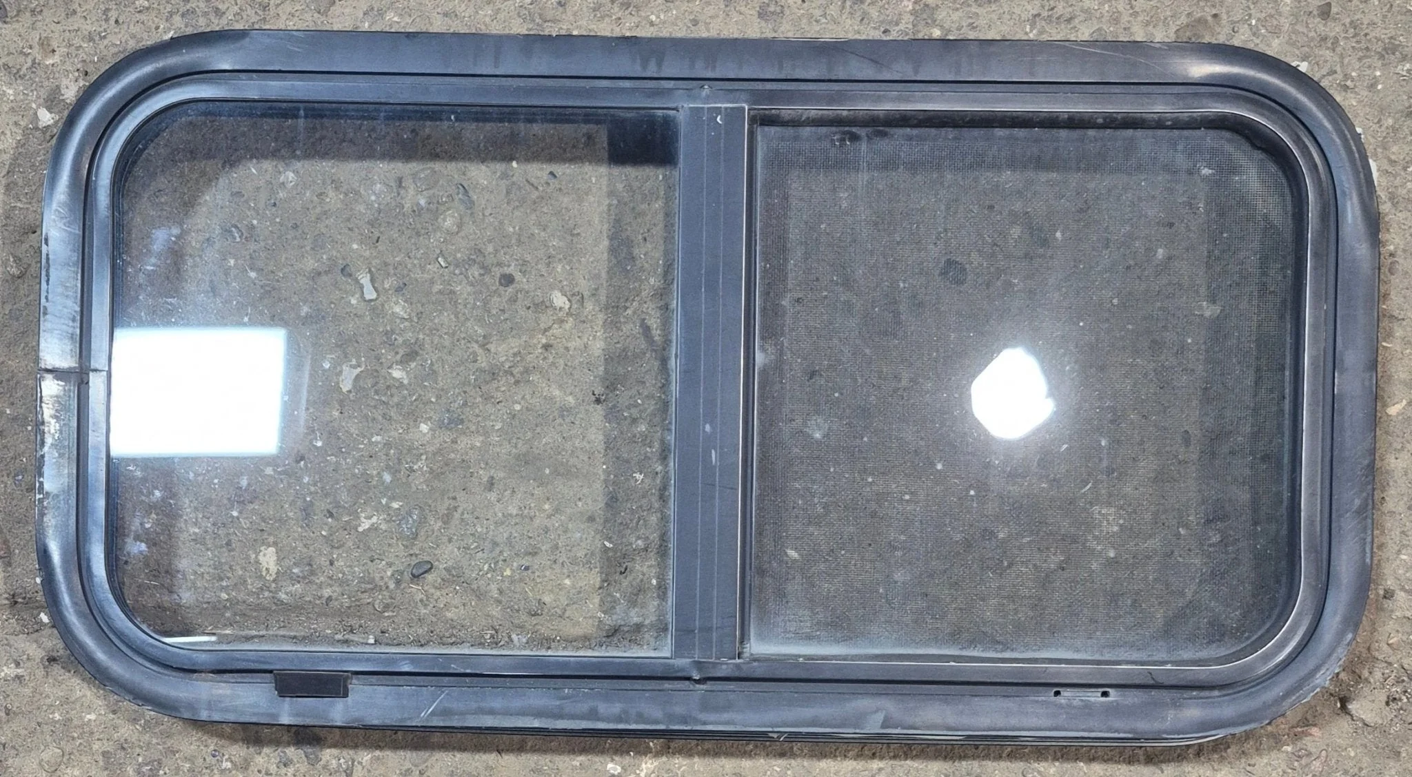 Used Black Radius Opening Window : 29 1/2" W x 14 3/4" H x 1 7/8"