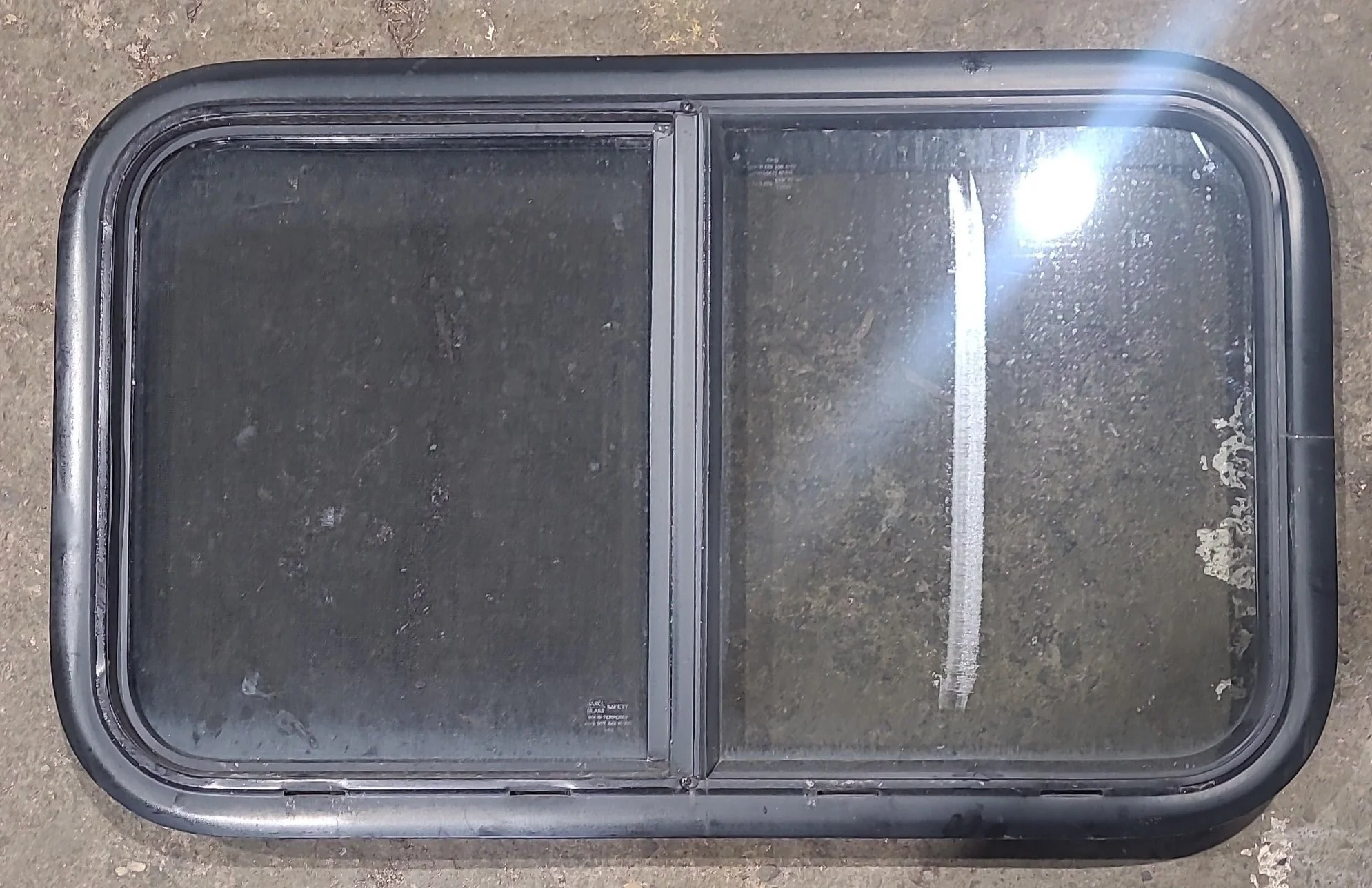 Used Black Radius Opening Window : 29 1/2" W x 17 1/2" H x 1 3/4" D