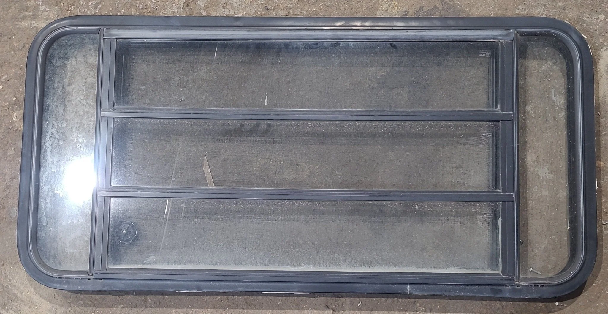 Used Black Radius Opening Window : 47 1/2" W x 22 1/4" H x 1 7/8" D