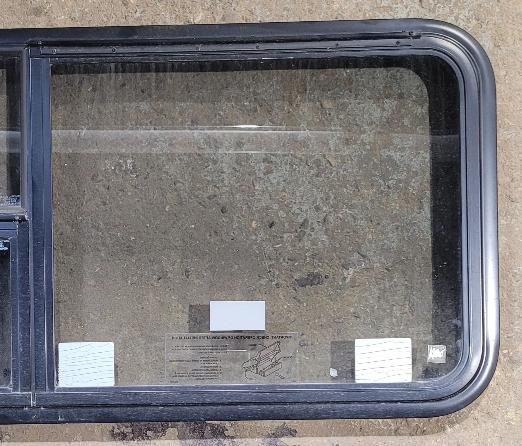 Used Black Radius Emergency Opening Window : 47 1/4" W x 21 1/4" H x 1 3/4" - Image 2