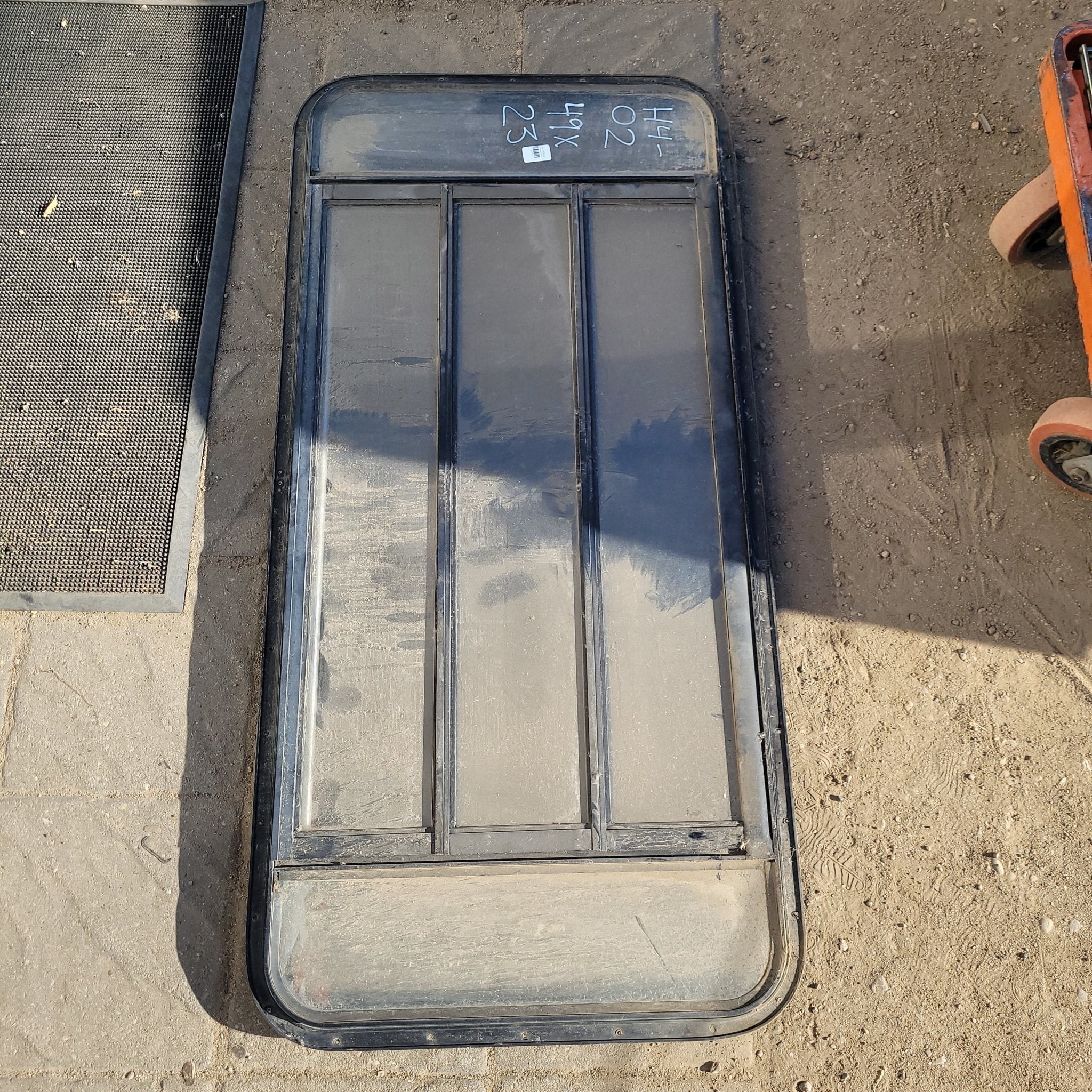 Used Black Radius Opening Window : 49 X 23 X 2" D