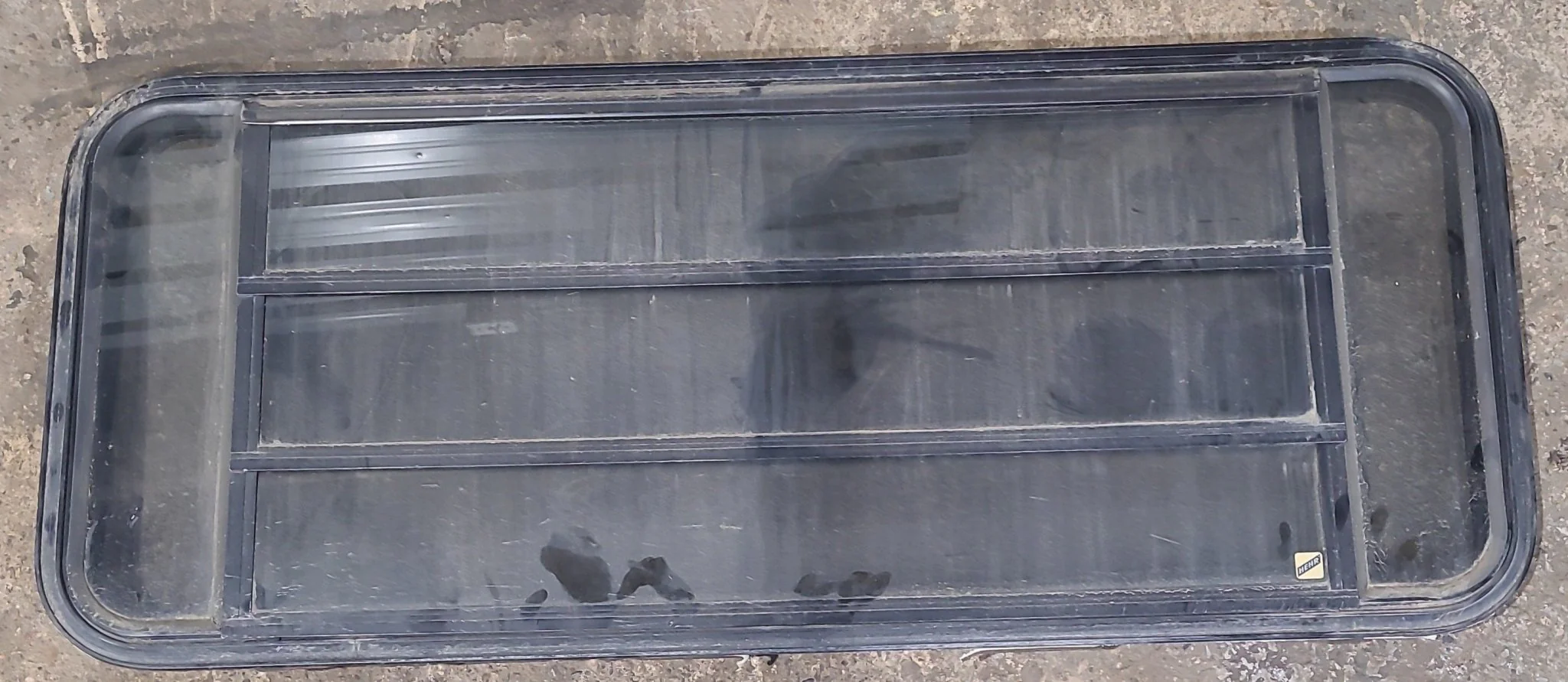 Used Black Radius Opening Window : 53 1/2" W x 21 3/4" H x 1 7/8" D