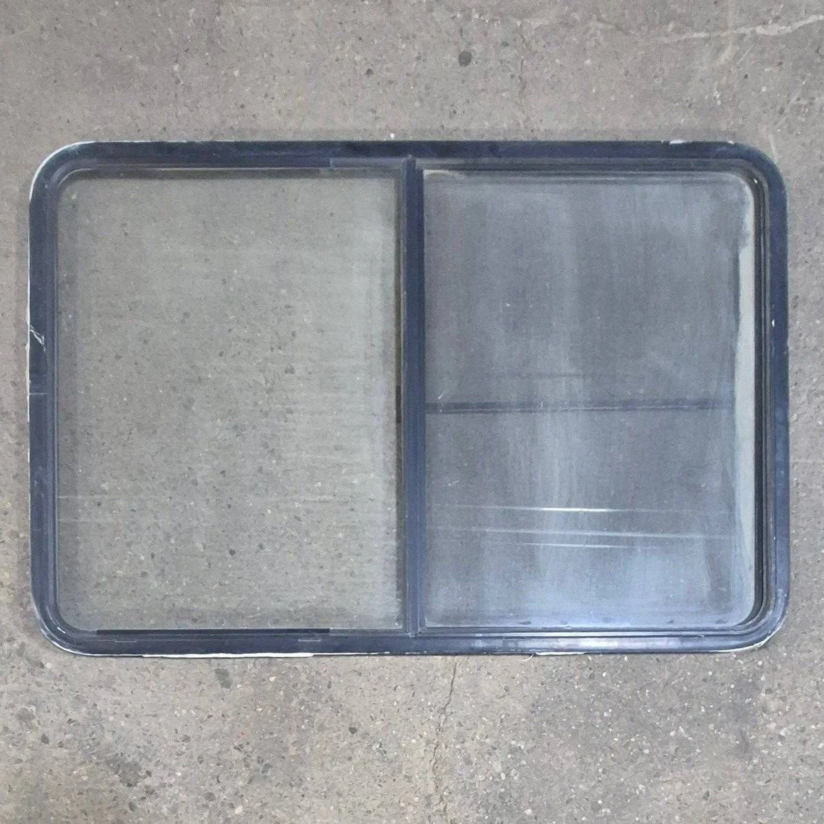 Used Black Radius Opening Window - 53 1/2" X 35 1/2" X 1 1/4"