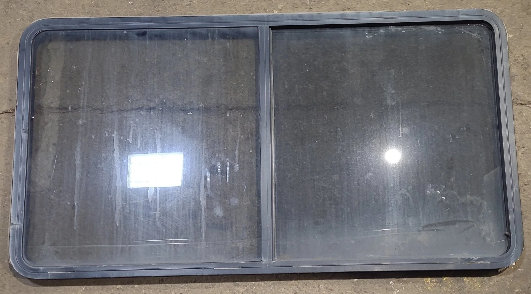 Used Black Radius Opening Window : 57" W x 27 3/4" H x 1 7/8" D