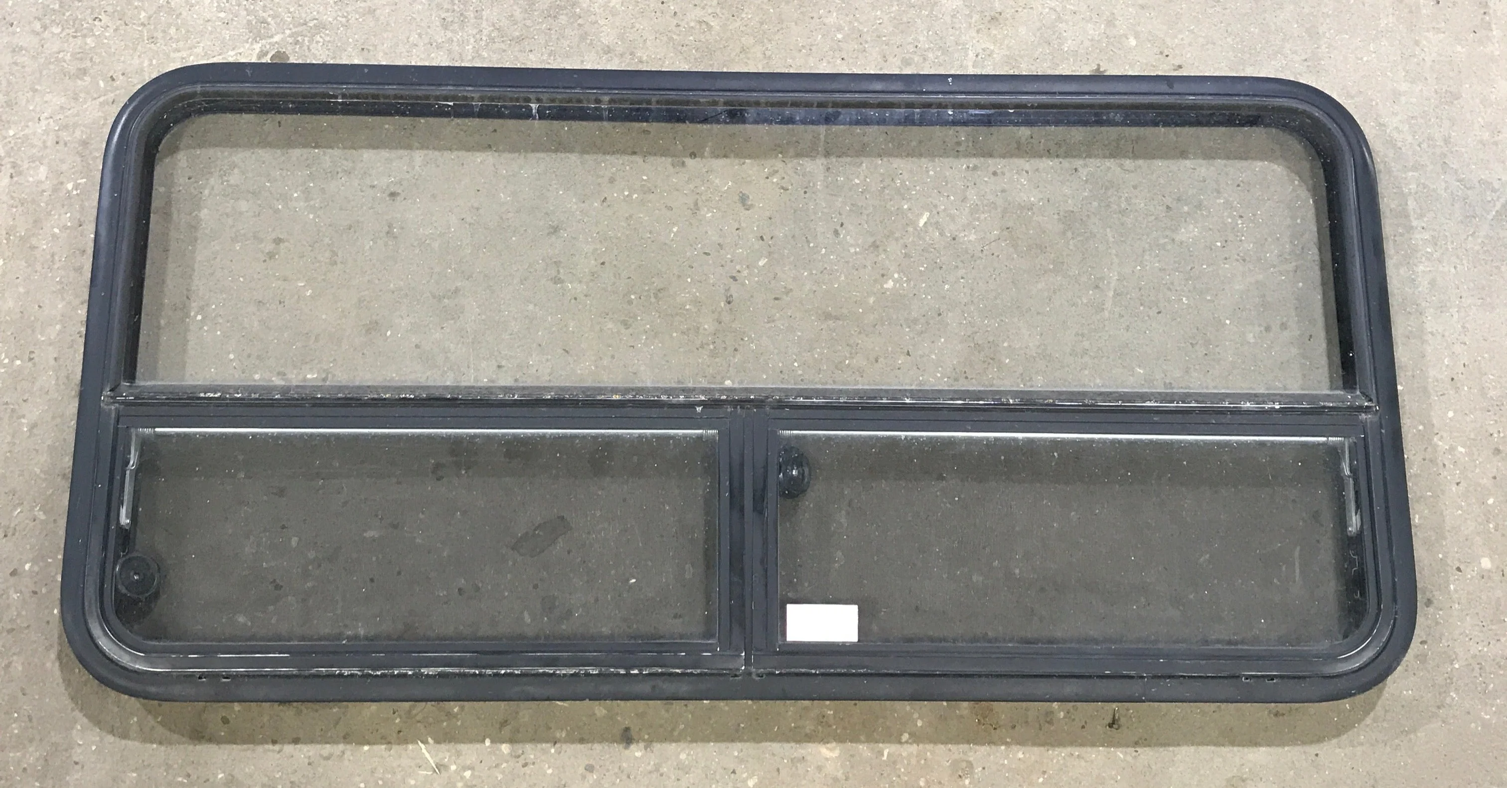 Used Black Radius Window : 53 1/4" W x 25 1/4" H x 2 1/4" D