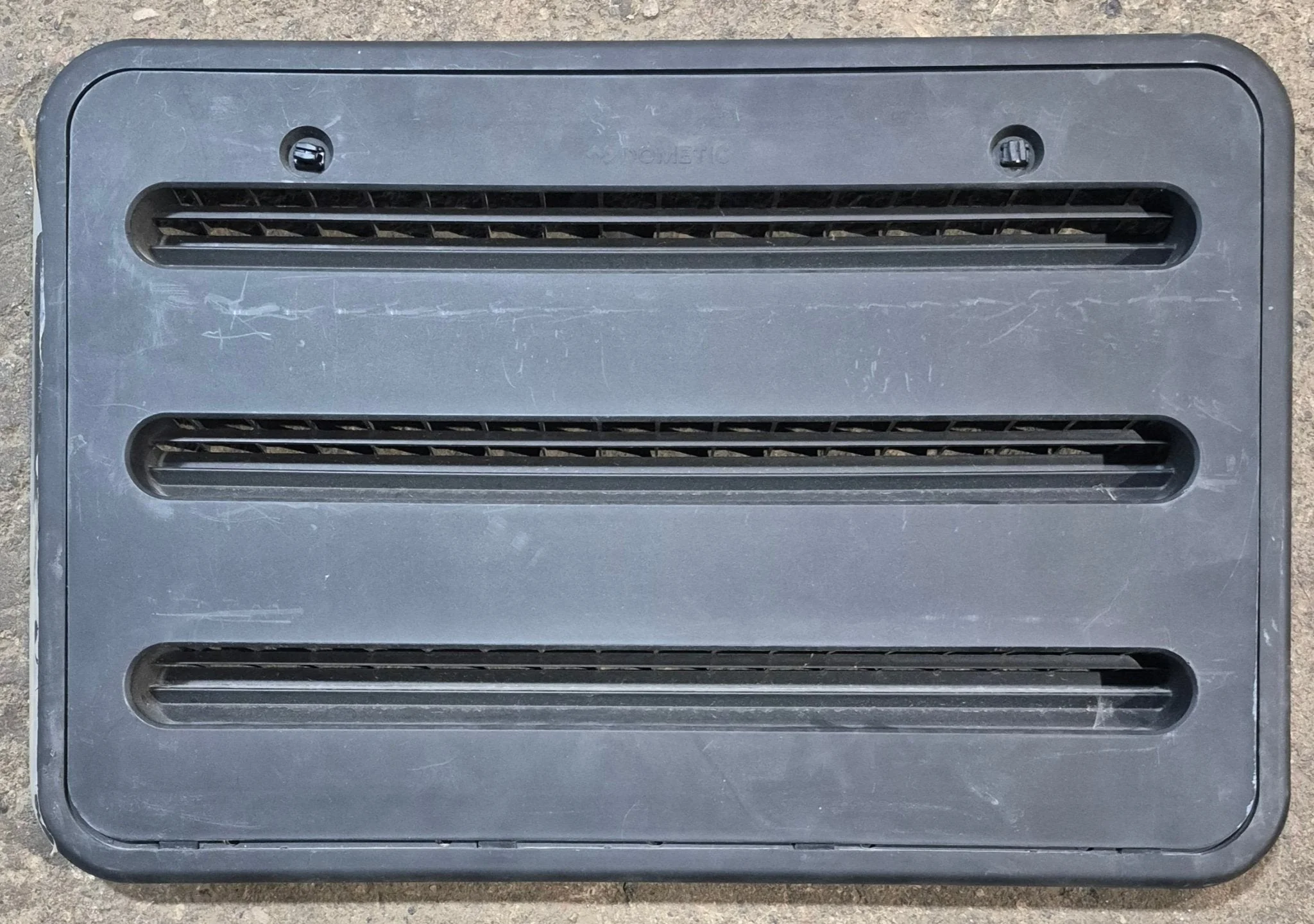 Used Dometic Black Air Intake Side Refrigerator Vent- HAS FRAME