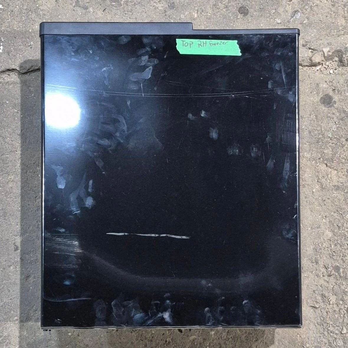 Used Norcold Refrigerator Upper (Freezer) Right Side Door, Black , 19 1/4" X 16 3/8" - 634073