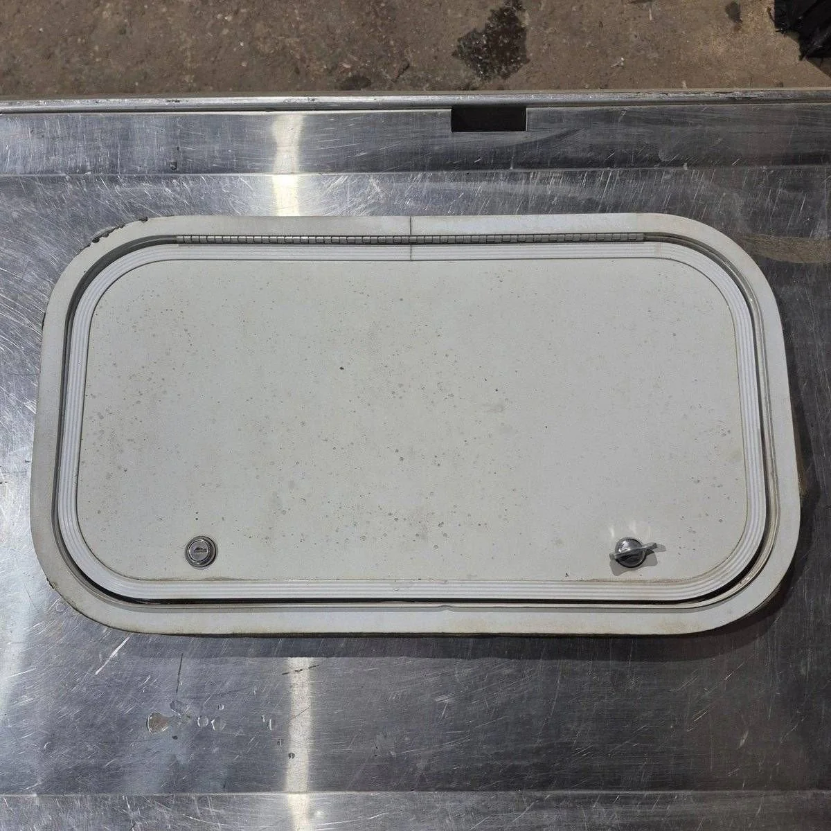 Used Radius Cornered Cargo Door - 21 7/8" X 11 3/4" X 1/2"