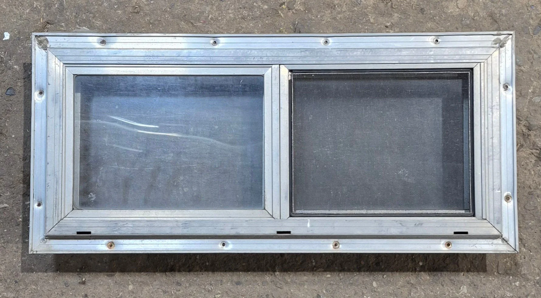 Used Silver Square Opening Window: 24" W x 10" H x 2 1/2" D