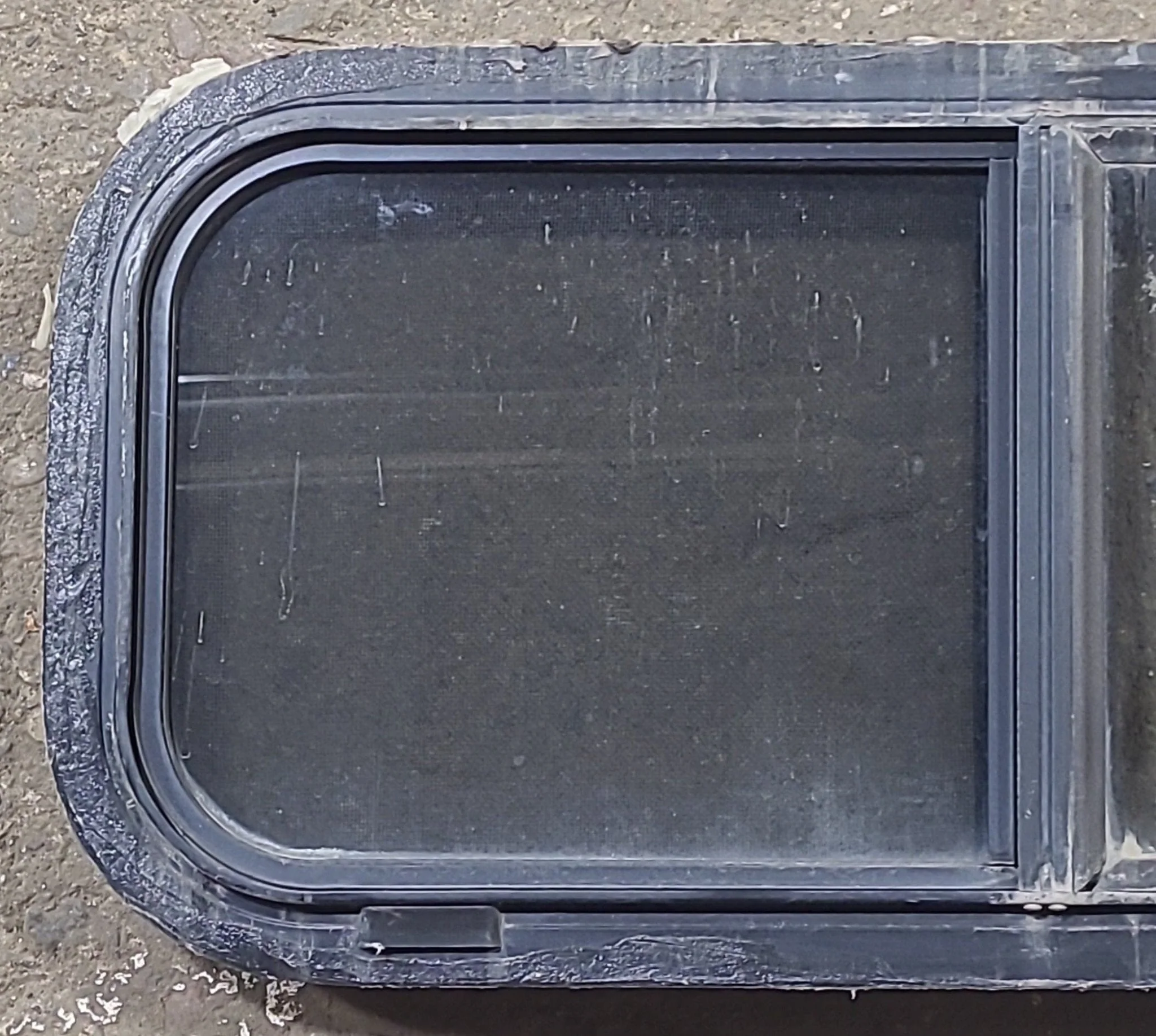Used Slanted Black Radius Opening Window : 30 1/4" W X 11 3/4" H X 1 7/8" D - Image 2