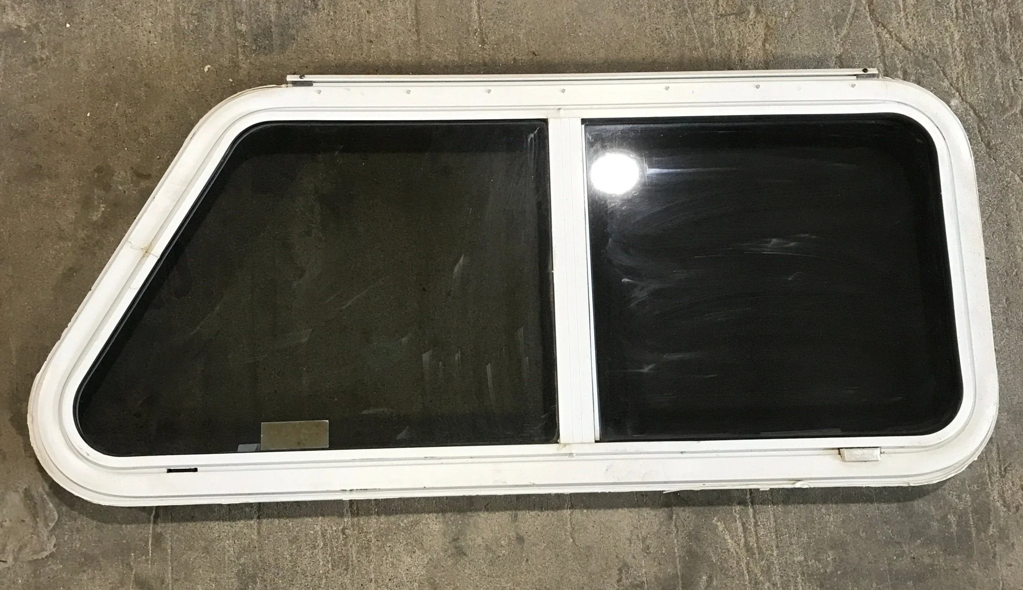 Used Slanted White Radius Emergency Opening Window : 42" W x 17 1/2" H x 2" D