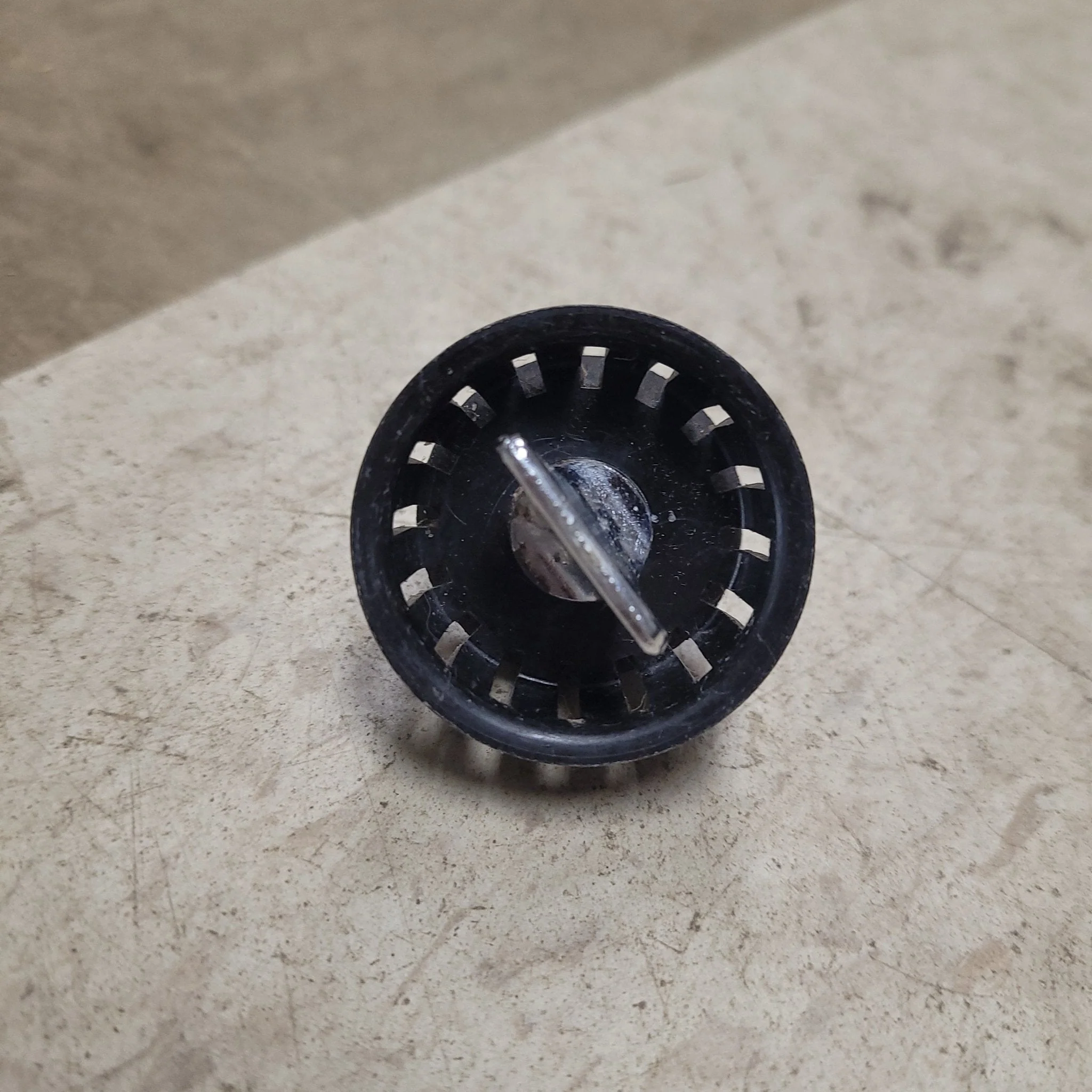 Used Twist Lock Strainer Plug for 2" Drain hole