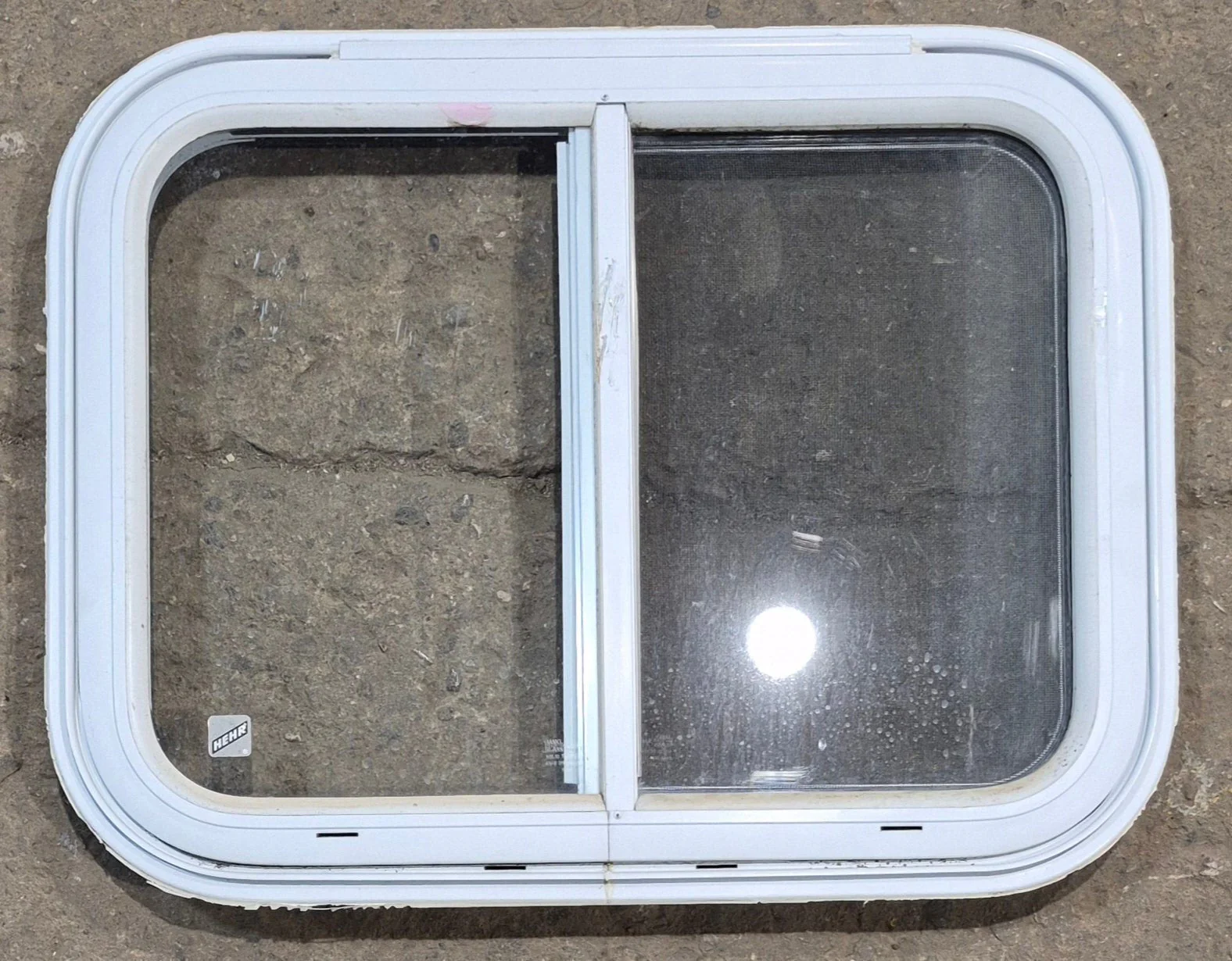 Used White Radius Emergency Opening Window : 25 1/2" W x 19 1/2" H x 1 1/4" D